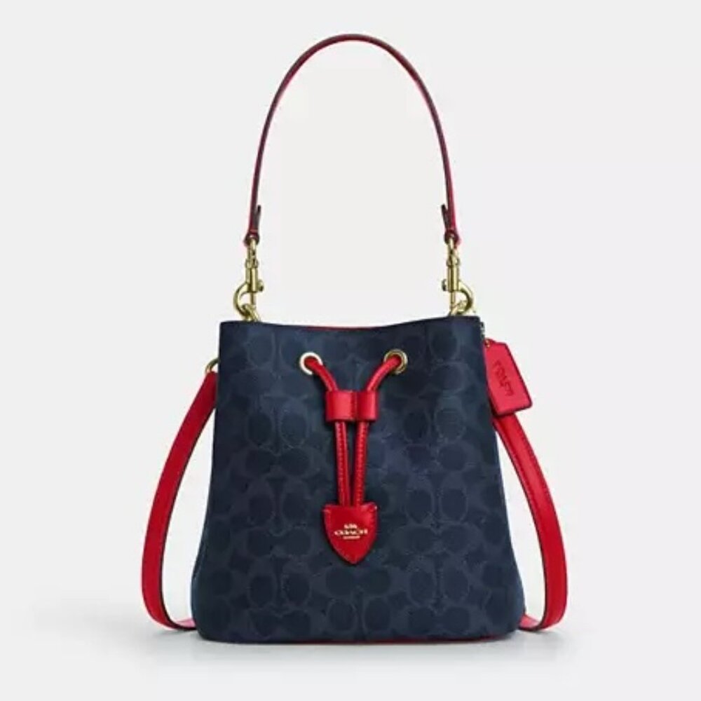 Rowan Bucket Bag In Signature Canvas